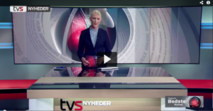 De børstede tænder på TV-journalisten